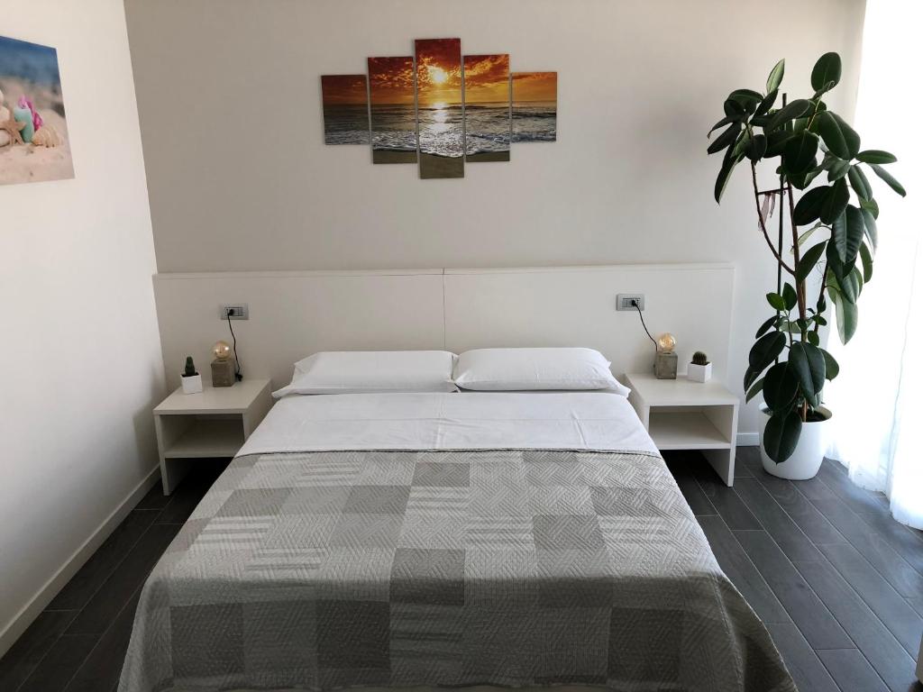 Postel nebo postele na pokoji v ubytování B&B Villa del Lago