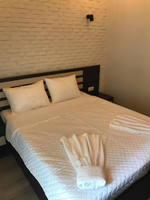 Postel nebo postele na pokoji v ubytování Iveria
