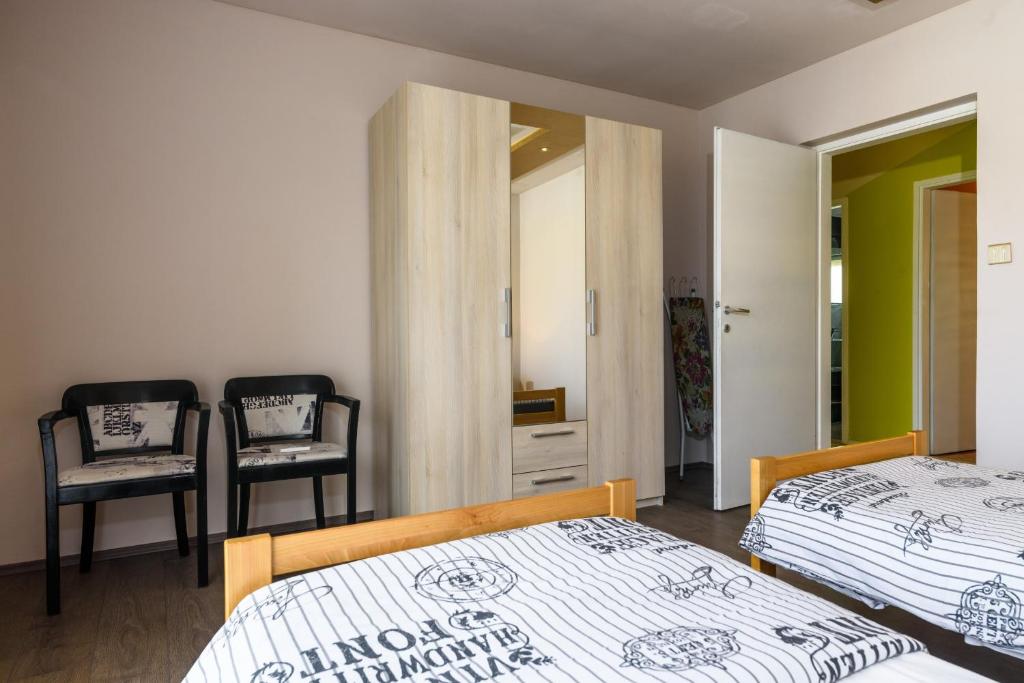Posteľ alebo postele v izbe v ubytovaní Apartments Lara - Split Croatia