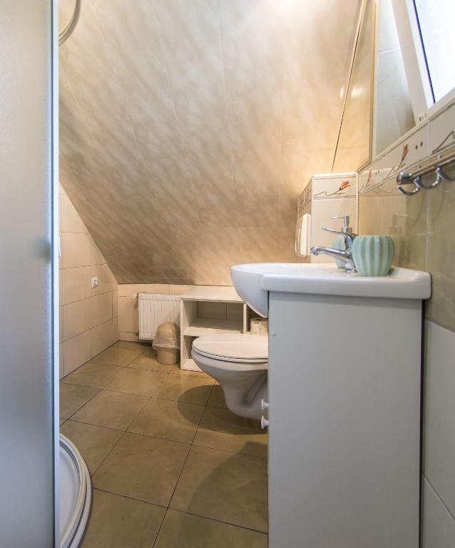 Kúpeľňa v ubytovaní Apartamenty Grapa szum rzeki parking free