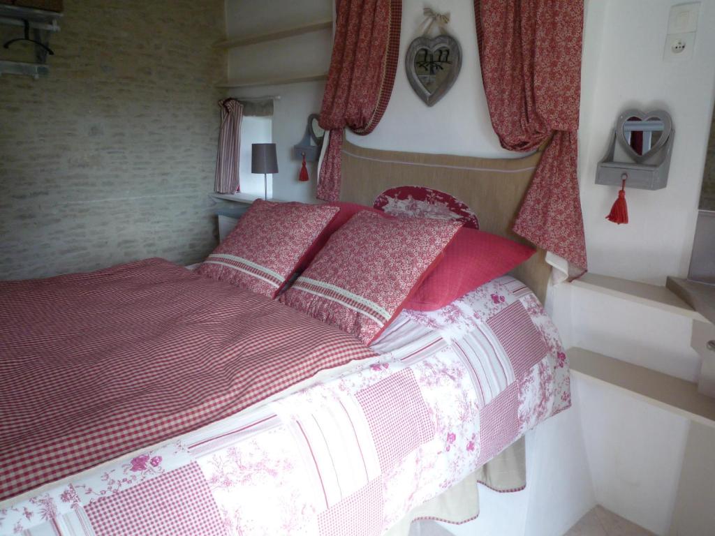 Postel nebo postele na pokoji v ubytování MANOIR de la RIVIERE