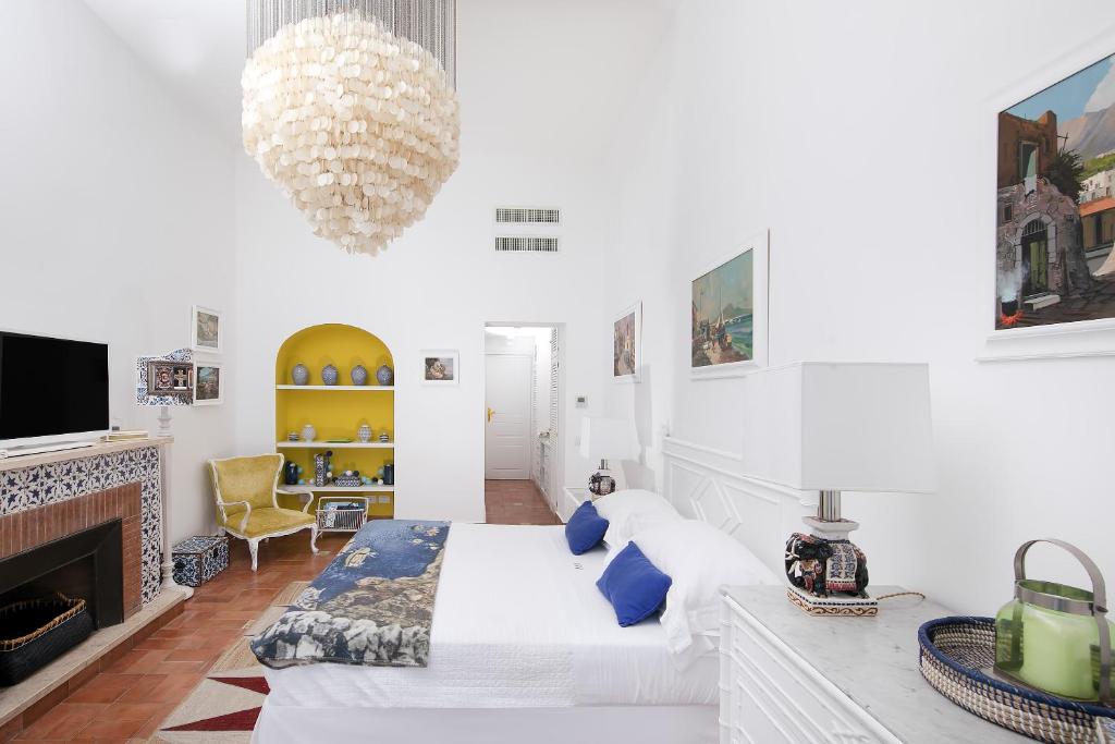 TV a/nebo společenská místnost v ubytování Casa Marta Capri