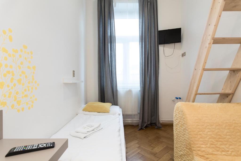 TV a/nebo společenská místnost v ubytování Pension Akat