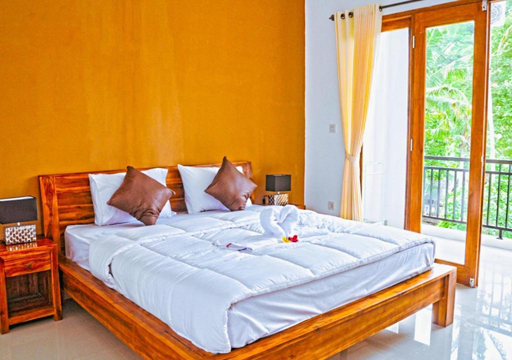 Postel nebo postele na pokoji v ubytování Kailash Homestay