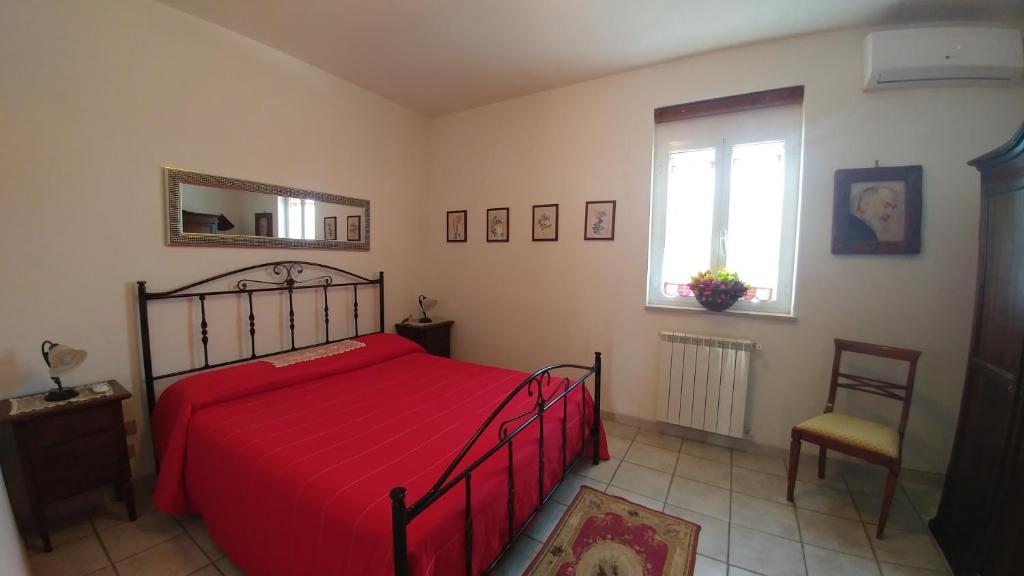 Postel nebo postele na pokoji v ubytování Villa Frantoio