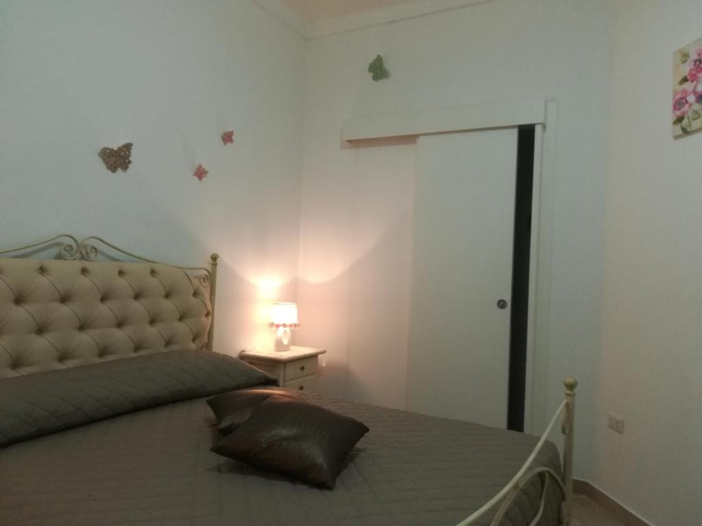 Postel nebo postele na pokoji v ubytování Elisea House