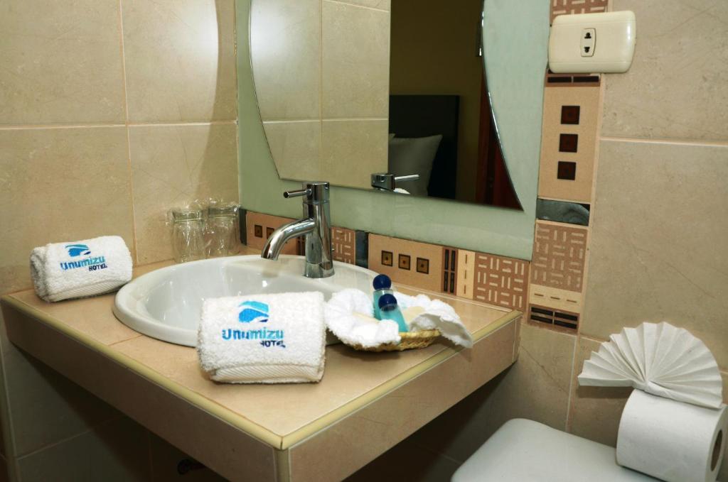 Koupelna v ubytování Kapac Inn Hotel