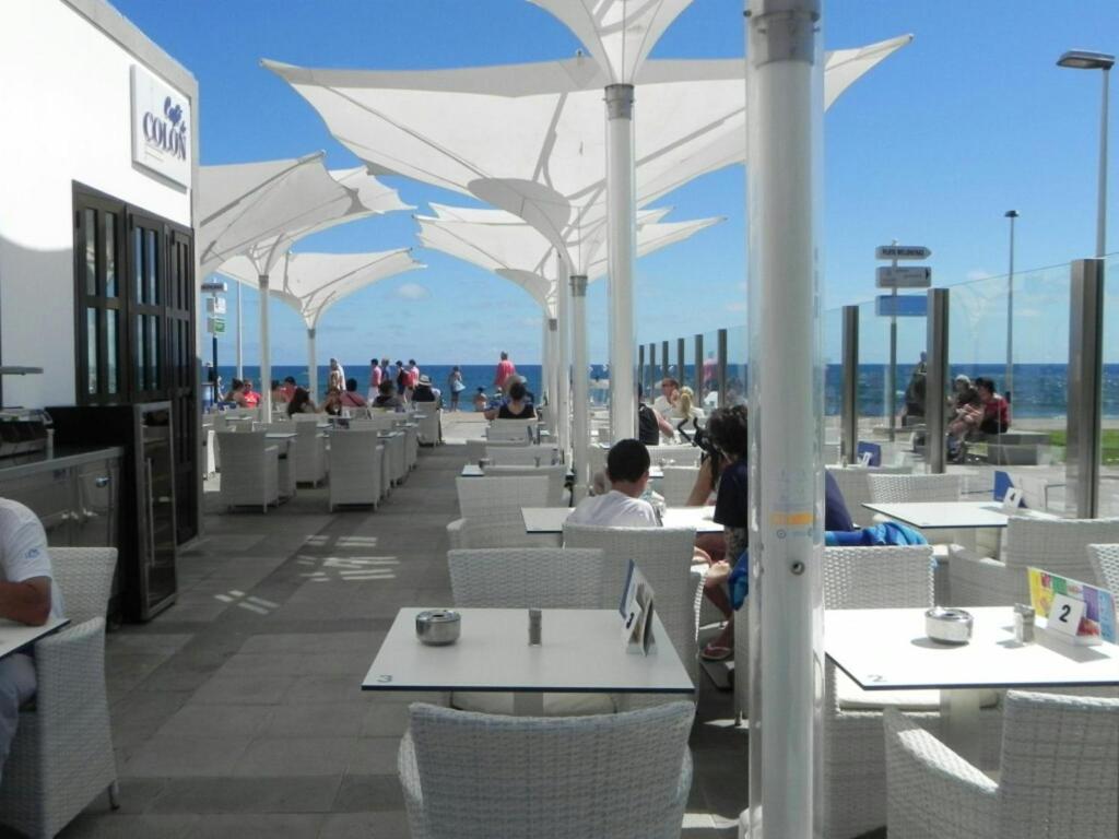 Reštaurácia alebo iné gastronomické zariadenie v ubytovaní Villa Feliz 44