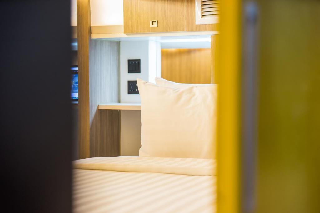Postel nebo postele na pokoji v ubytování Nonze Hostel