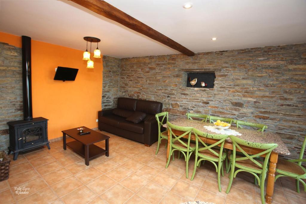 Posedenie v ubytovaní Apartamentos Bouso