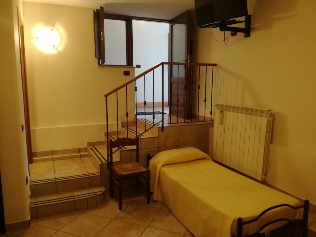 Łóżko lub łóżka w pokoju w obiekcie Agriturismo Costiera Amalfitana