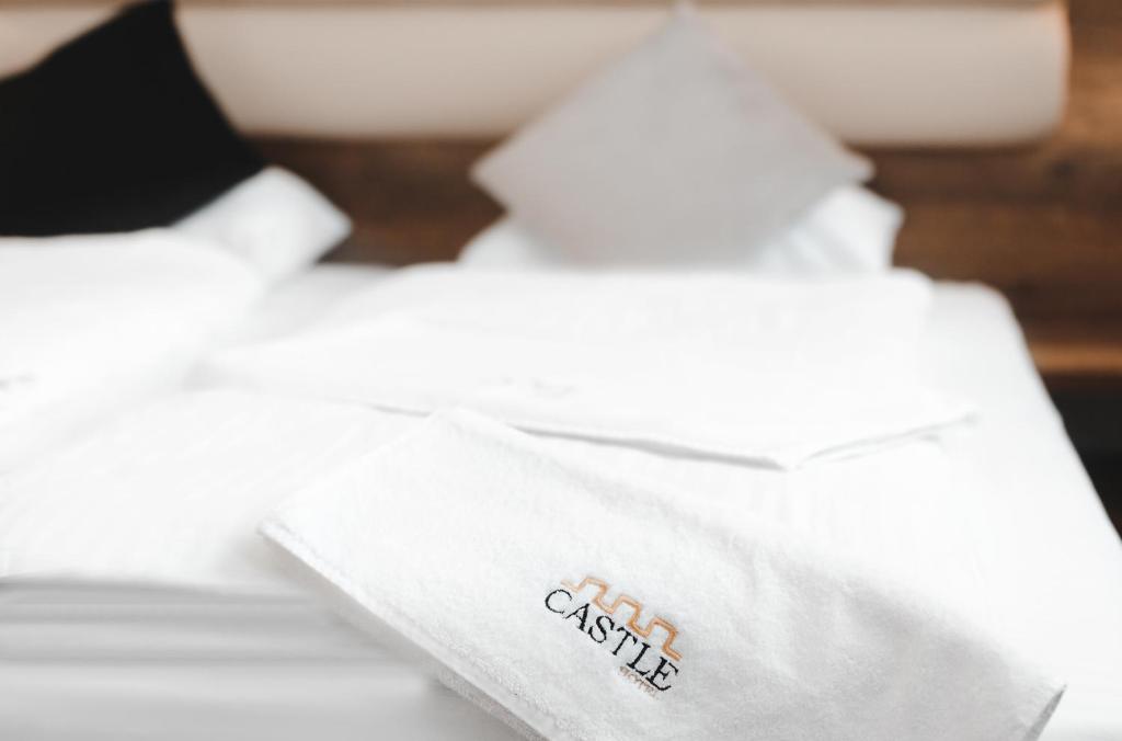 Ein Bett oder Betten in einem Zimmer der Unterkunft Hotel Castle Rastatt