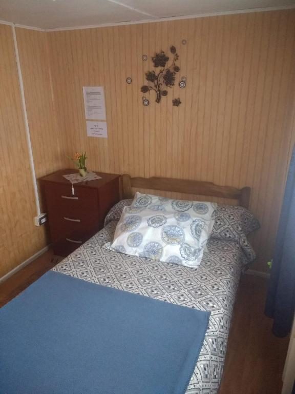 Postel nebo postele na pokoji v ubytování "Mi Hostal Tu Casa" Hostal Familiar SOLO EMPRESAS, TURISTAS y VIAJEROS Espacio para BICICLETAS y MOTOS