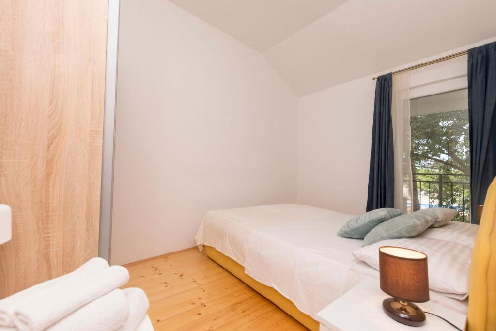 Postel nebo postele na pokoji v ubytování House Ante