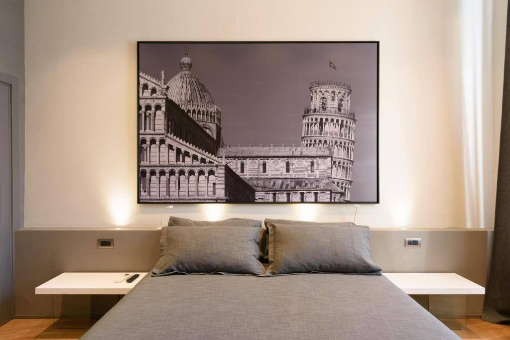 Palazzo Vasarri - Luxury design suitesにあるベッド