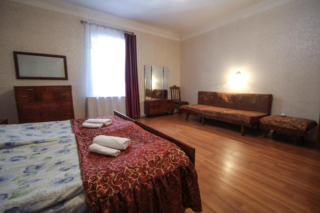 Postel nebo postele na pokoji v ubytování Eka&Nino GuestHouse