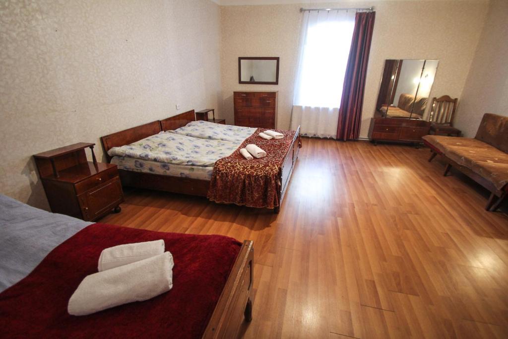 Postel nebo postele na pokoji v ubytování Eka&Nino GuestHouse