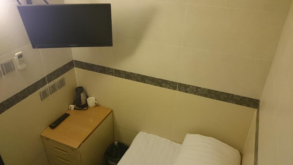 Sjónvarps- og/eða afþreyingartæki á B&B Mongkok Hotel