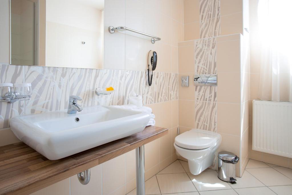 Koupelna v ubytování Hotel U Pramenu