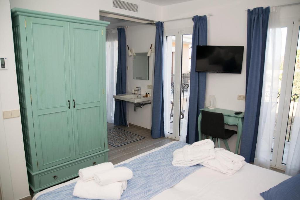 Posteľ alebo postele v izbe v ubytovaní Boutique Hotel Petit Sant Miquel