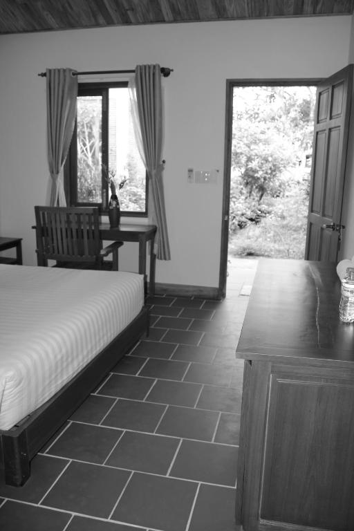 Postel nebo postele na pokoji v ubytování Sam Ong Lang Homestay