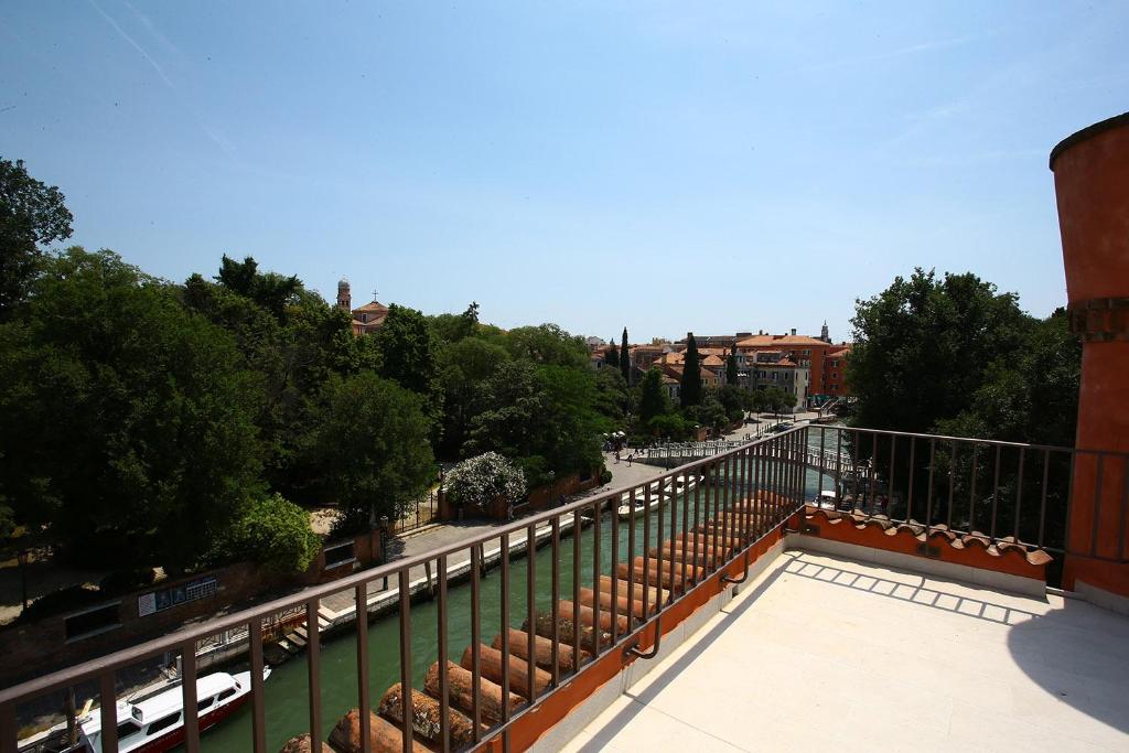 a balcony with a view of a street at Hotel Santa Chiara in Venice