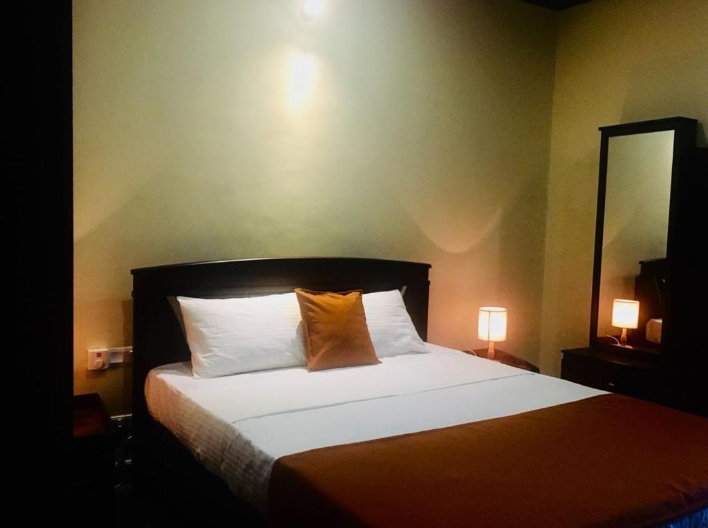 Postel nebo postele na pokoji v ubytování Riverdale Ridge Homestay