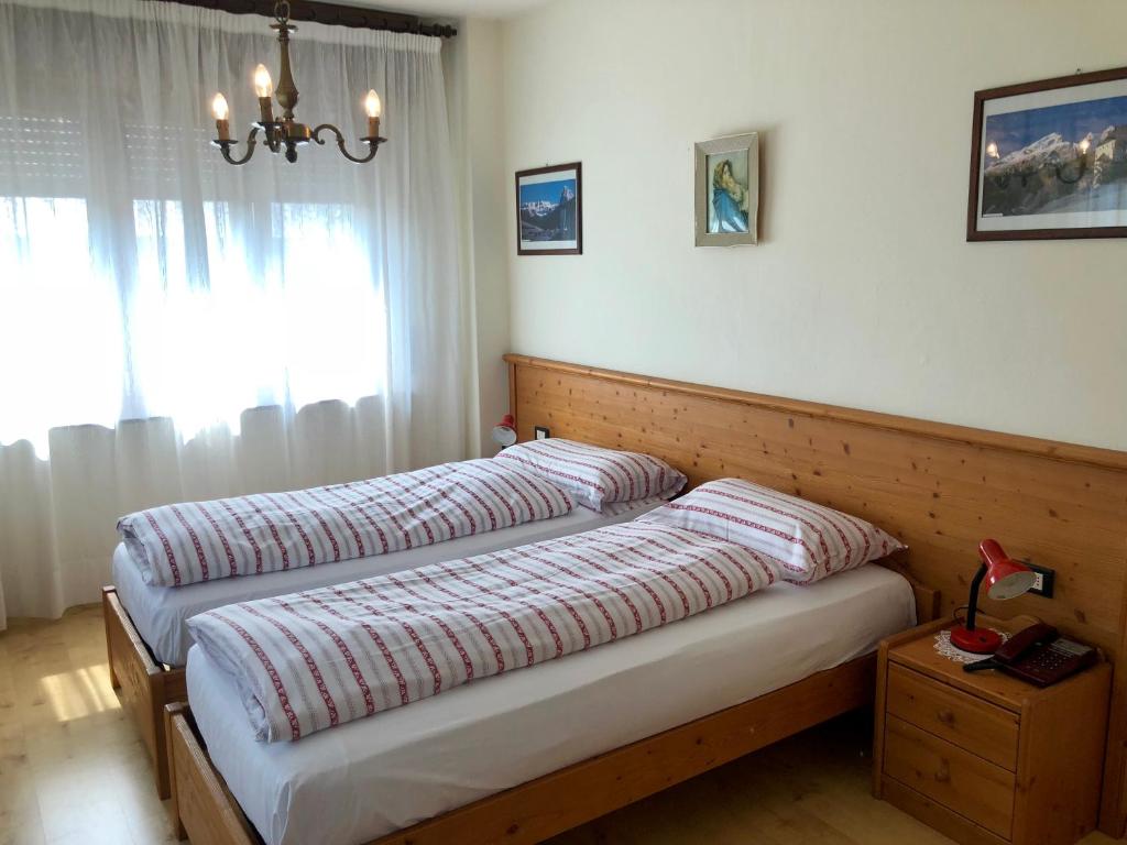 Postel nebo postele na pokoji v ubytování Stella Alpina