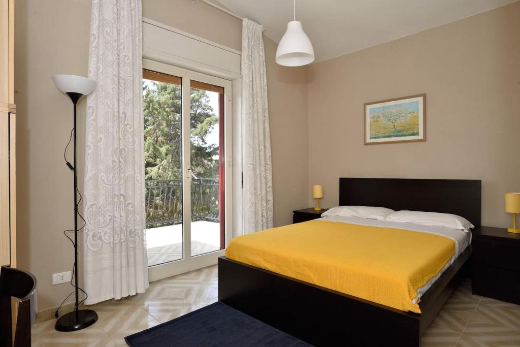 Postel nebo postele na pokoji v ubytování Terra Di Mare