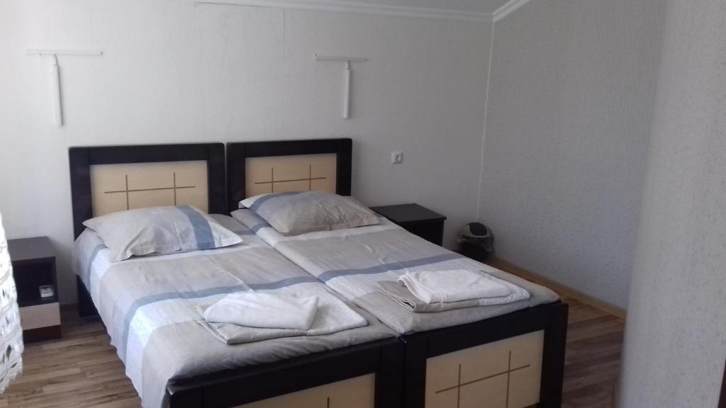 Postel nebo postele na pokoji v ubytování Martvili Newhotel