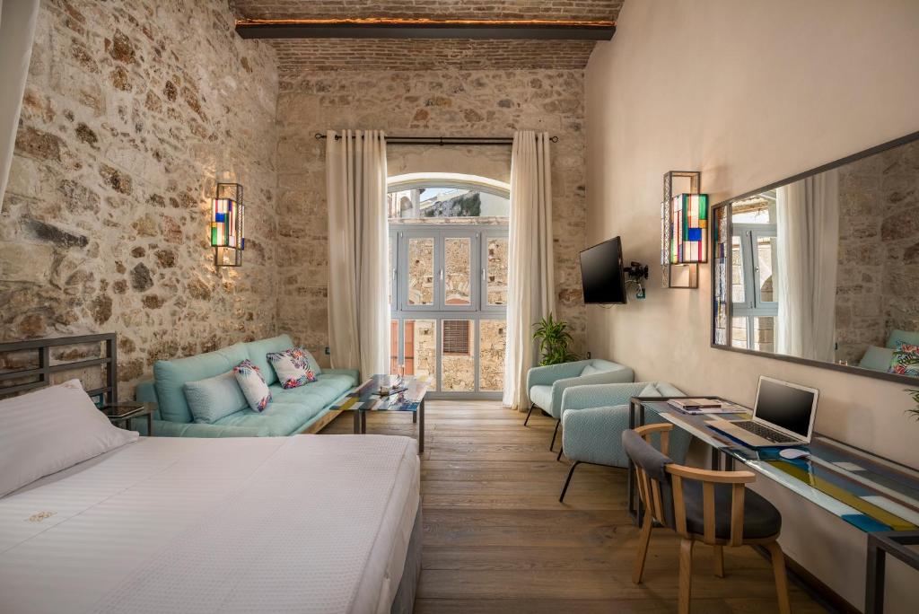 Posteľ alebo postele v izbe v ubytovaní Ambassadors Residence Boutique Hotel