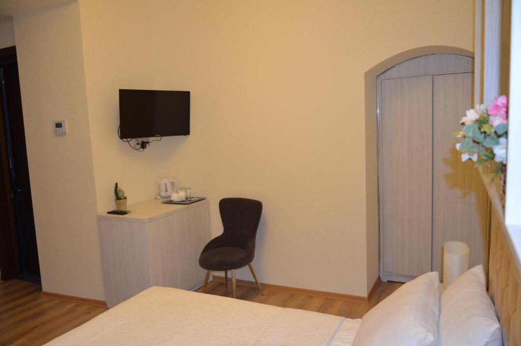 TV a/nebo společenská místnost v ubytování Hotel Griboedov