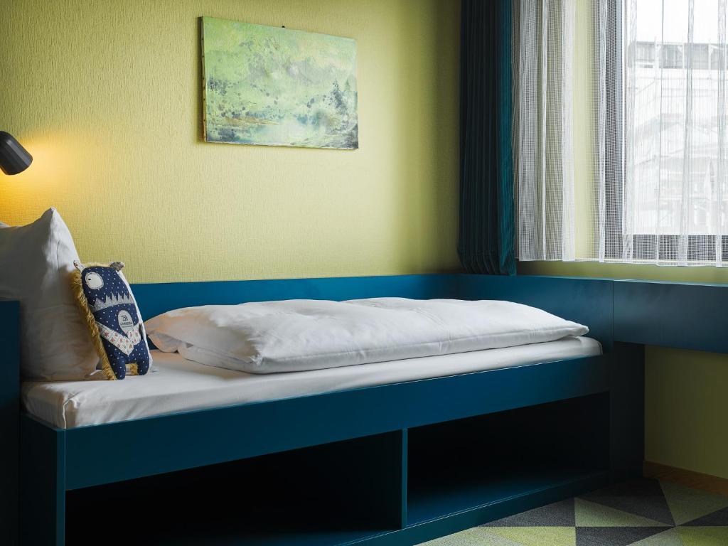 Cama ou camas em um quarto em 25hours Hotel The Trip