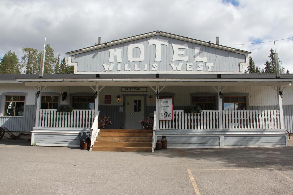 a building with a sign that reads motel wills nest at Motel Willis West in Ruka