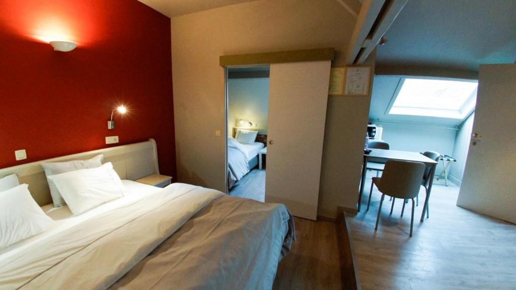 Postel nebo postele na pokoji v ubytování B&B Ter Gracht