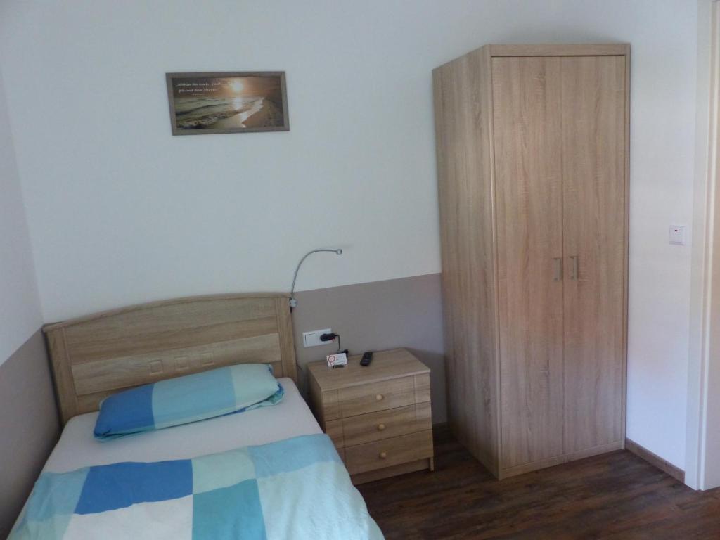 Postel nebo postele na pokoji v ubytování Wellness Pension Salzgrotte