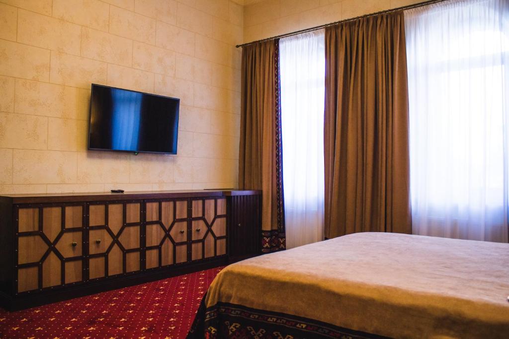 TV a/nebo společenská místnost v ubytování Hotel Mastara