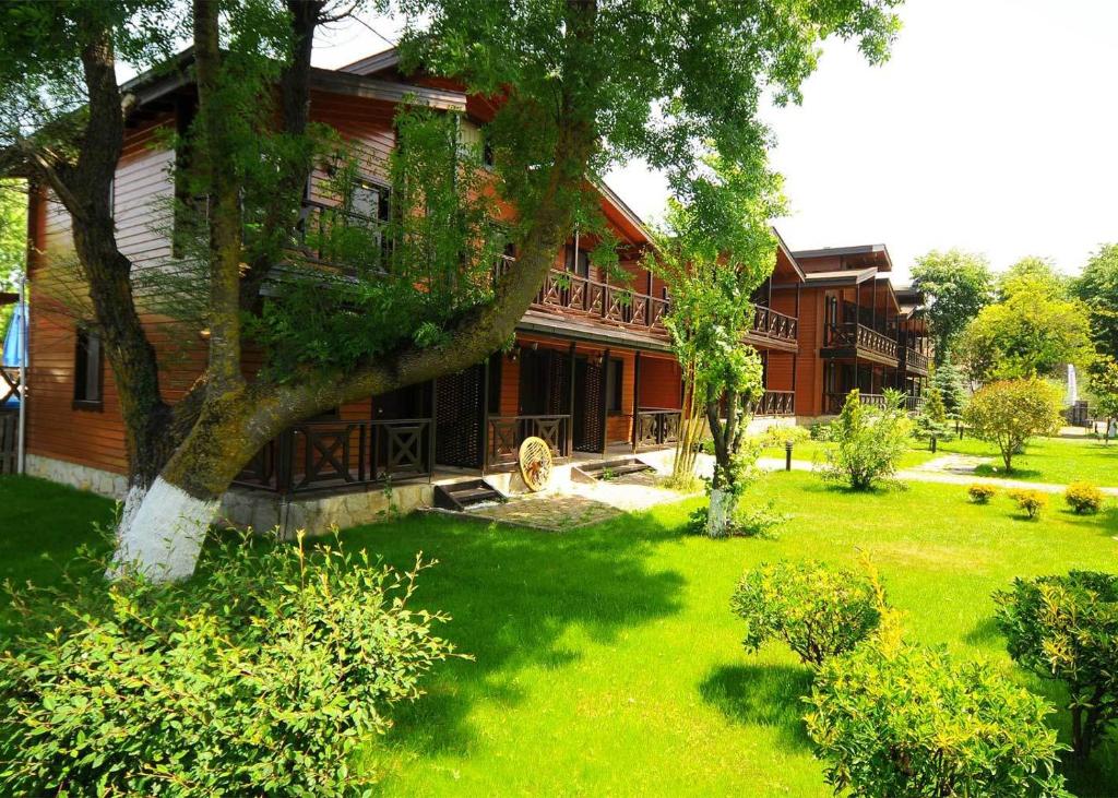an aerial view of a house with a yard at Agva Robin's Nest in Ağva