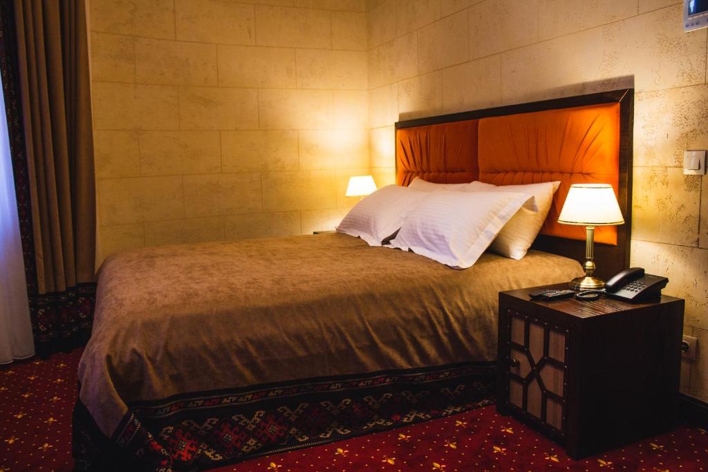 Postel nebo postele na pokoji v ubytování Hotel Mastara