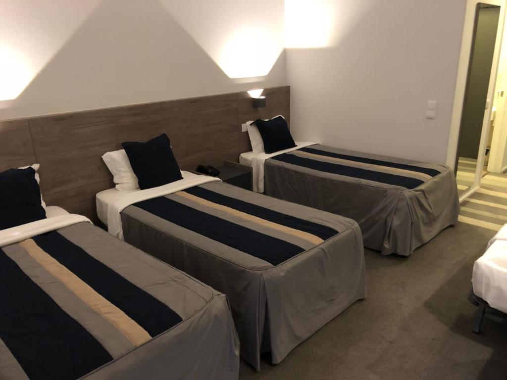 Postel nebo postele na pokoji v ubytování Hotel do Parque