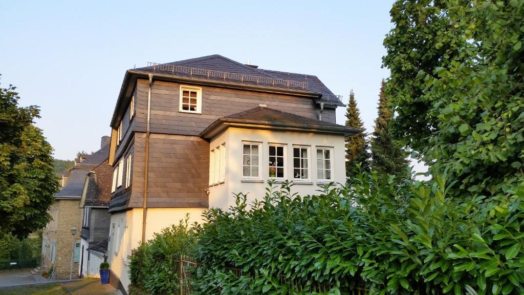 an old house with a brown roof at Schlossblick Herborn in Herborn