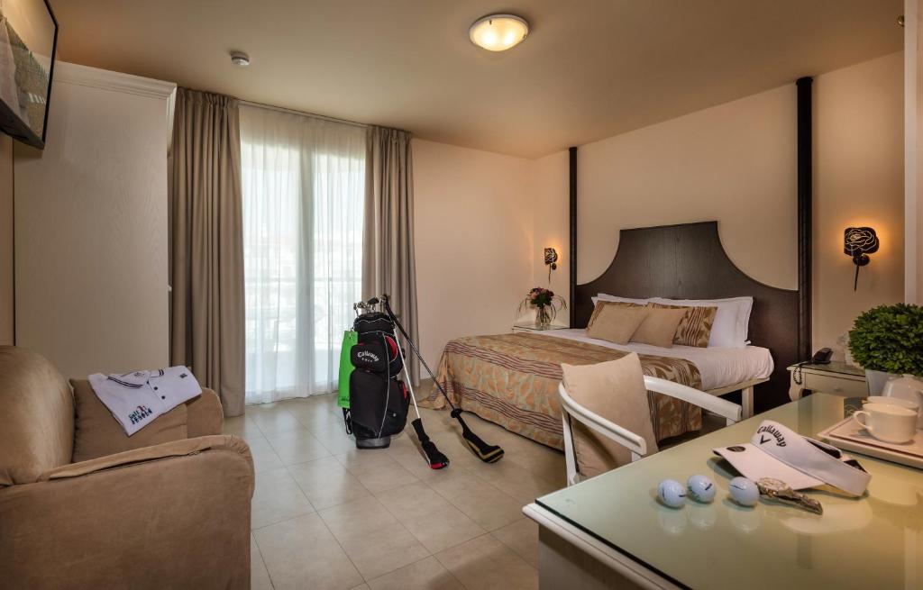 Postel nebo postele na pokoji v ubytování Baia del Mar Beach Boutique Hotel