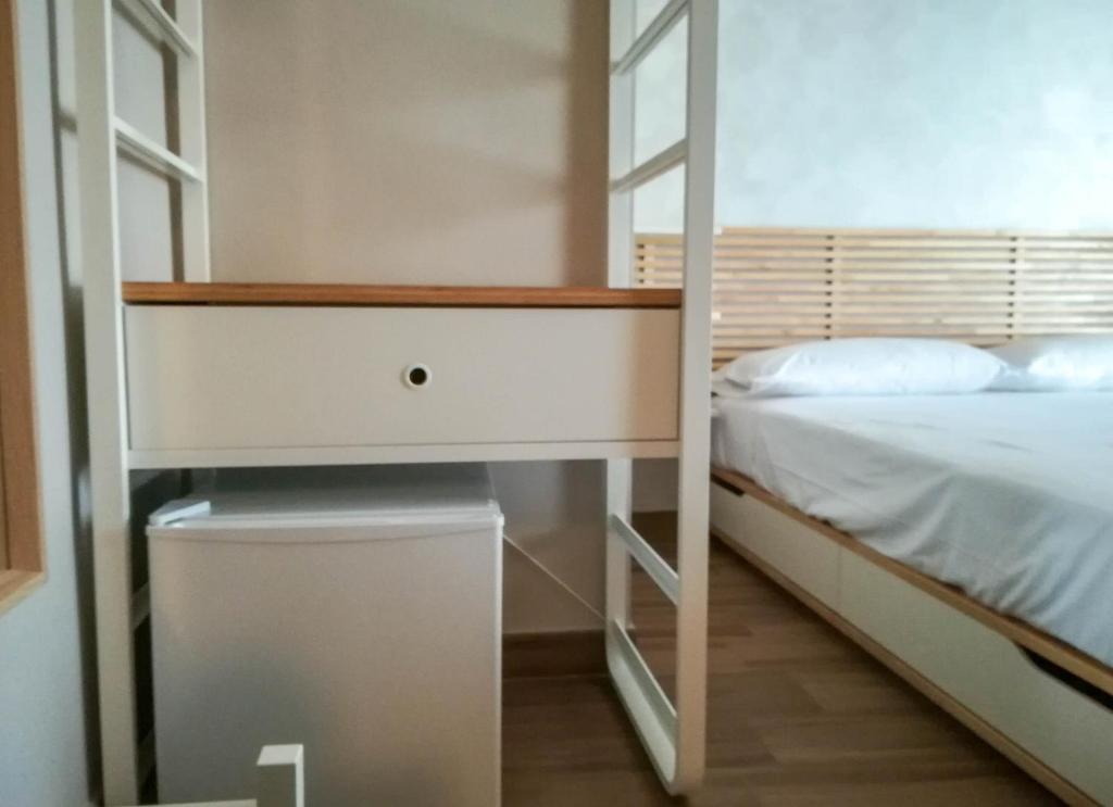 Postel nebo postele na pokoji v ubytování A.J. B&B