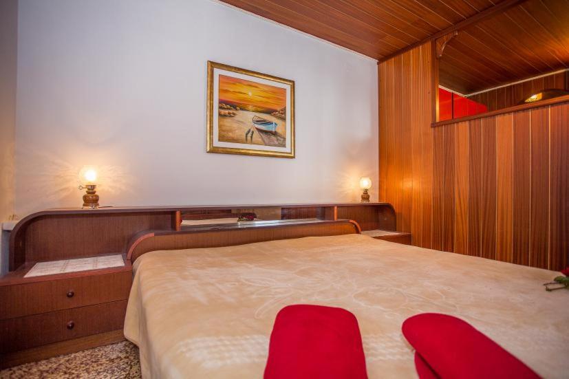 Postel nebo postele na pokoji v ubytování Vila Anita