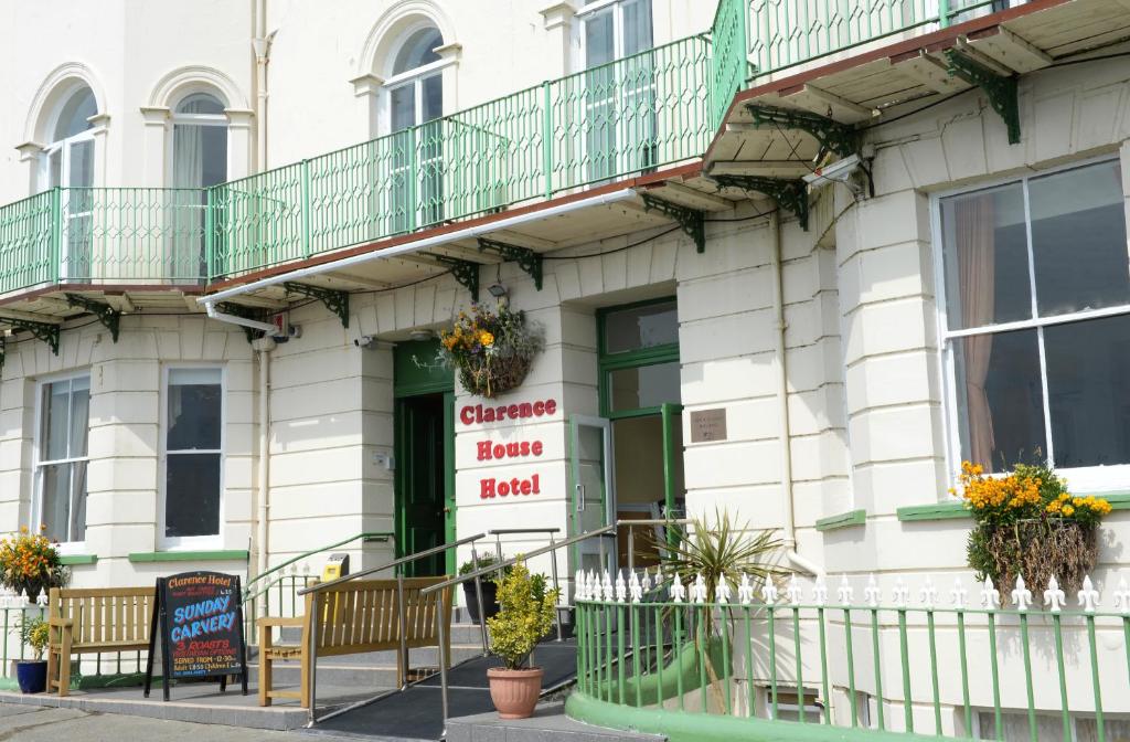 a building with a sign that reads emergency hand had at Clarence House Hotel in Tenby