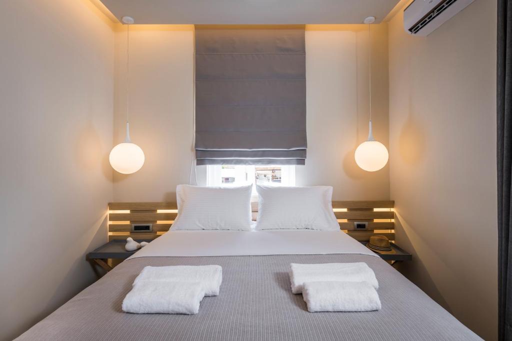Posteľ alebo postele v izbe v ubytovaní Sun Ray Luxury Apartments