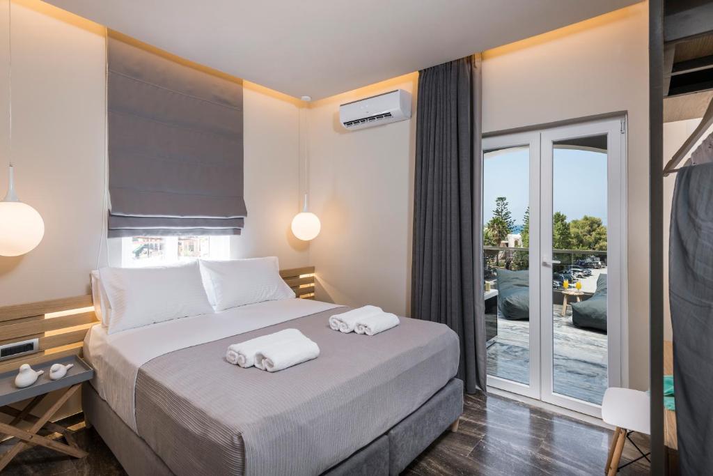 Posteľ alebo postele v izbe v ubytovaní Sun Ray Luxury Apartments