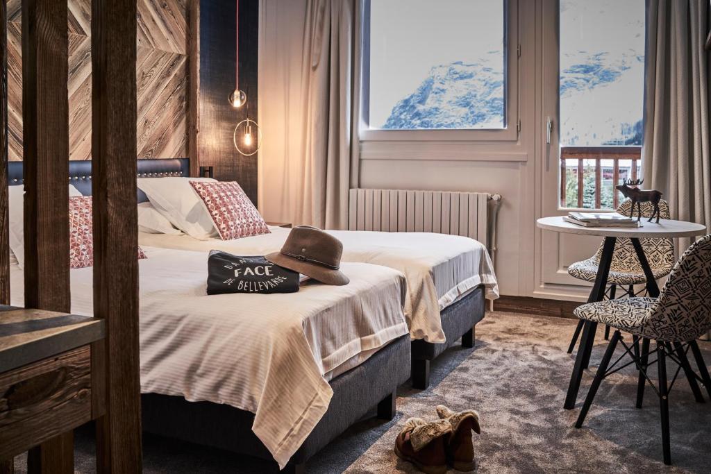 Postel nebo postele na pokoji v ubytování Hotel Altitude