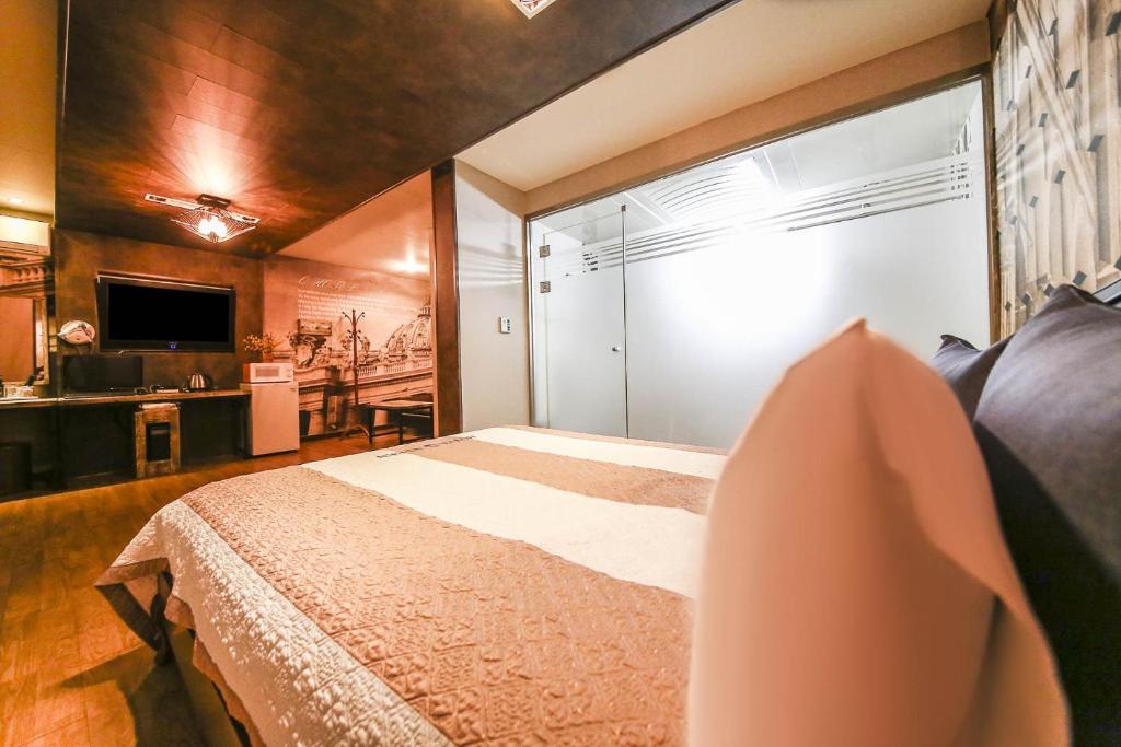 Kuchyň nebo kuchyňský kout v ubytování Q Hotel Yongin