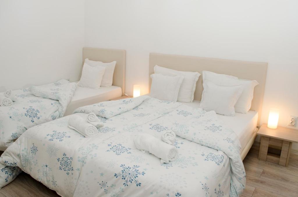 Postel nebo postele na pokoji v ubytování Villa Re3ca